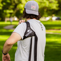 Disc Golfer wearing a Disc Golf training aid called Throform sold at Smash & Tap Discs, a disc golf shop in Idaho serving Meridian, Boise, Nampa, Caldwell, Star, and Eagle.