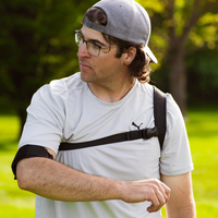 Disc Golfer wearing a Disc Golf training aid called Throform sold at Smash & Tap Discs, a disc golf shop in Idaho serving Meridian, Boise, Nampa, Caldwell, Star, and Eagle.
